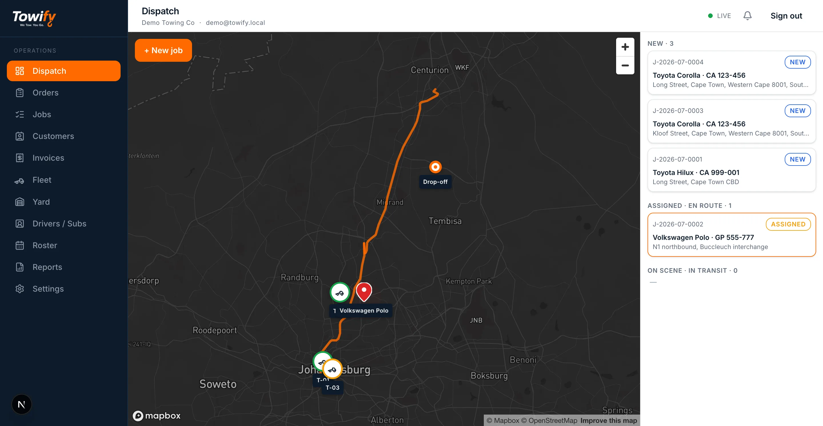 Towify dispatch console: live map with trucks, routes and the job queue